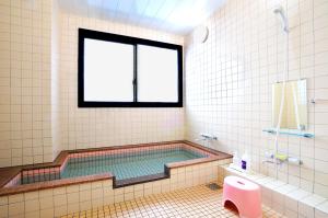 Koupelna v ubytování Sunstay Kaseda