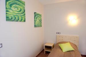 Ein Bett oder Betten in einem Zimmer der Unterkunft Les Hauts du Gevaudan
