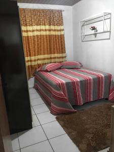Krevet ili kreveti u jedinici u okviru objekta Jucelio João Inácio
