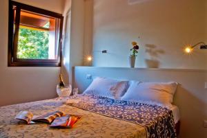 מיטה או מיטות בחדר ב-Principessa Pio