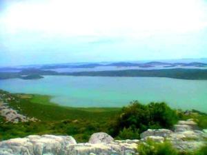 a view of a large body of blue water at Apartmani kod Rade in Pakoštane