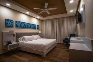 Satama Hotel客房内的一张或多张床位