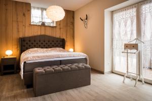 Ένα ή περισσότερα κρεβάτια σε δωμάτιο στο Ferienwohnung Paulina bis 2P Ferienwohnung Josefine bis 4P