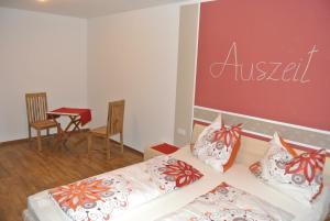 A bed or beds in a room at Kornihof