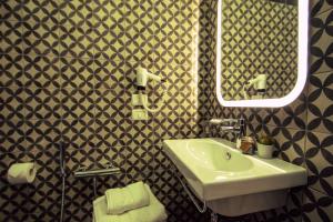 Koupelna v ubytování Arsenale Suites + 32 fotografií