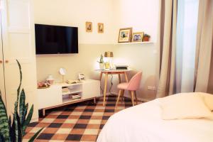 Postel nebo postele na pokoji v ubytování Arsenale Suites