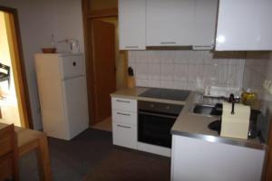 Kuchyňa alebo kuchynka v ubytovaní Ella Apartments