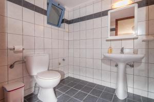 A bathroom at Roula Apartments