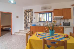 A kitchen or kitchenette at Roula Apartments