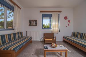 A seating area at Roula Apartments