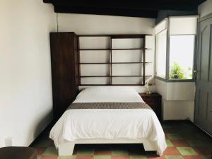 Letto o letti in una camera di Hostal Posada del Maple