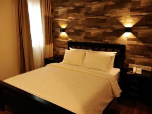 Postel nebo postele na pokoji v ubytování Wifi Boutique Hotel