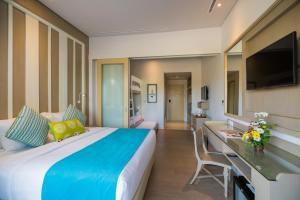 TV a/nebo společenská místnost v ubytování Grand Mirage Resort & Thalasso Bali - All Inclusive