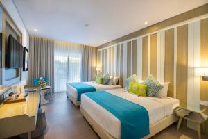 TV a/nebo společenská místnost v ubytování Grand Mirage Resort & Thalasso Bali - All Inclusive