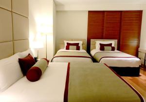 Katil atau katil-katil dalam bilik di Oryx Airport Hotel -Transit Only