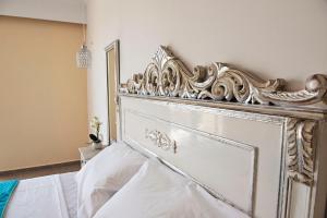 Postel nebo postele na pokoji v ubytování Hotel Kalithea