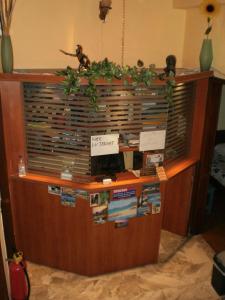 a large book shelf with books on it at Pia Rooms in Chania