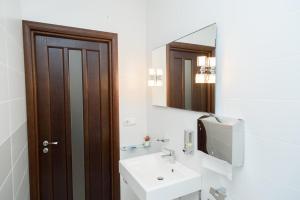 Koupelna v ubytování M&M Aparthotel