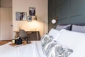 Ένα ή περισσότερα κρεβάτια σε δωμάτιο στο Agora Vista Acropolis +40 φωτογραφίες