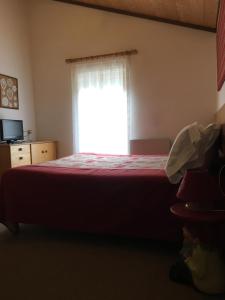 Voodi või voodid majutusasutuse B&B Monte Giove Formazza toas