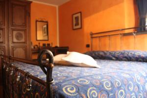 A bed or beds in a room at Lo Teisson