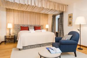 Letto o letti in una camera di Schloss Prielau Hotel & Restaurants