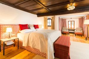 Letto o letti in una camera di Schloss Prielau Hotel & Restaurants