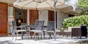 A patio or other outdoor area at Il Gabbiano Piano Terra - Goelba