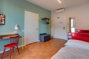 A bed or beds in a room at MEININGER Milano Garibaldi