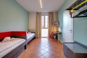 A bed or beds in a room at MEININGER Milano Garibaldi