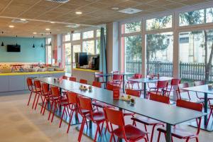 A restaurant or other place to eat at MEININGER Milano Garibaldi