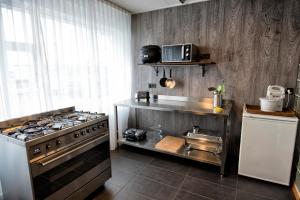 Cucina o angolo cottura di B14 Hostel
