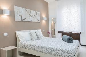 Ένα ή περισσότερα κρεβάτια σε δωμάτιο στο Holiday Home Taormina 3