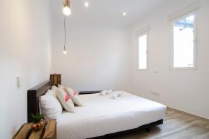 Łóżko lub łóżka w pokoju w obiekcie Luminoso familiar- 2D 2B- Cava Alta
