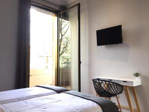 TV a/nebo společenská místnost v ubytování Hip Karma Hostel
