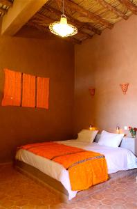 Postel nebo postele na pokoji v ubytování Riad Nomad