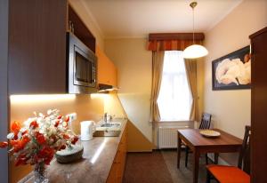 TV a/nebo společenská místnost v ubytování Anyday Apartments