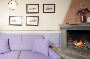 A seating area at Villa il Pino by VacaVilla
