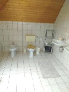 Koupelna v ubytování Apartment Scharhörn