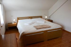 Un pat sau paturi într-o cameră la Casa Teresa Martin