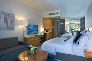 Letto o letti in una camera di Agamim by Isrotel Collection
