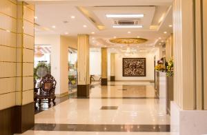 a corridor of a hotel with a lobby at Bazan Xanh in Buon Ma Thuot