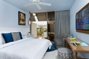 Letto o letti in una camera di Agamim by Isrotel Collection