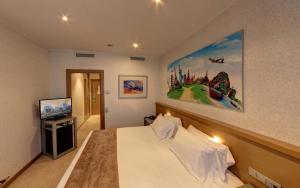 Postel nebo postele na pokoji v ubytování Hotel Mas Camarena