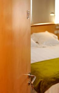 
Cama o camas de una habitación en Boutique Hotel Holos
