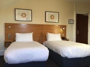 Postel nebo postele na pokoji v ubytování Stotfield Hotel