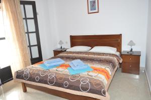 Postel nebo postele na pokoji v ubytování Giannis Maria Apartments
