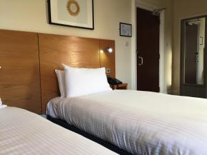 Postel nebo postele na pokoji v ubytování Stotfield Hotel