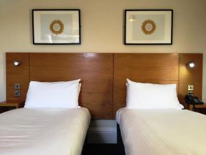 Postel nebo postele na pokoji v ubytování Stotfield Hotel