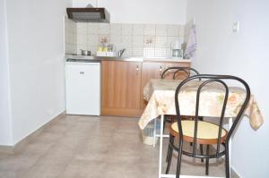 Kuchyň nebo kuchyňský kout v ubytování Giannis Maria Apartments